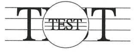 The word TEST magnified by a circular lens held over a ruled paper